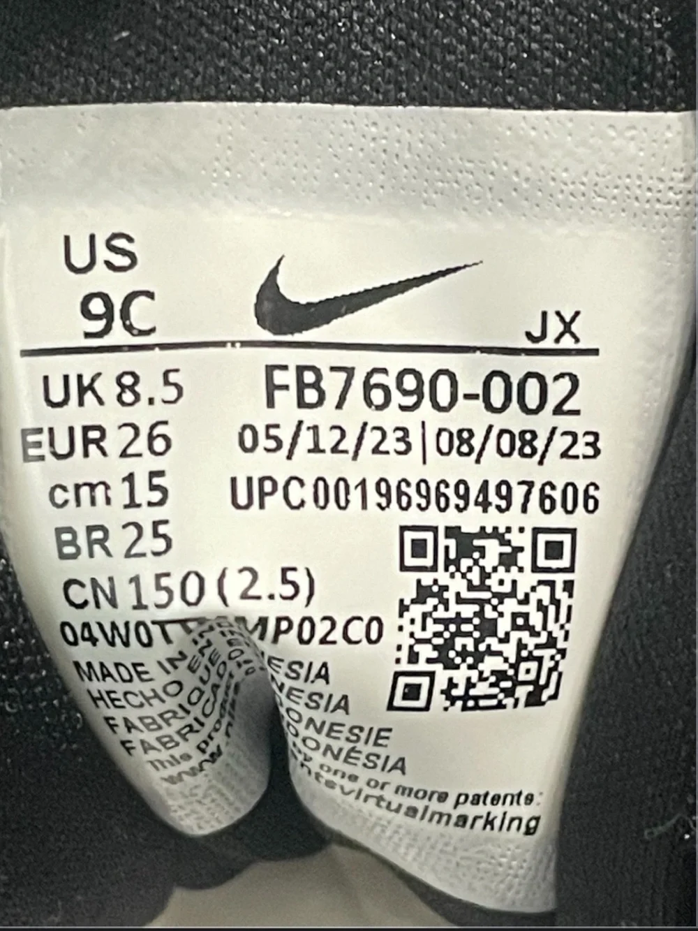 Nike Kids Black Sneakers with Pink Accents